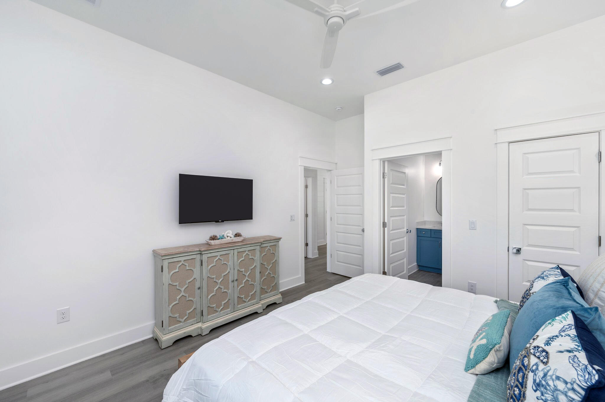 4553 Luke Avenue Destin, FL 32541 - Photo 23 of 70 a bedroom with a bed and a flat screen tv