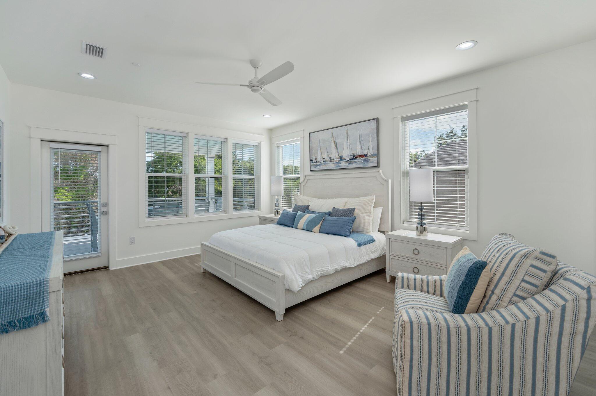 4553 Luke Avenue Destin, FL 32541 - Photo 37 of 70 a bedroom with a large bed and a large window