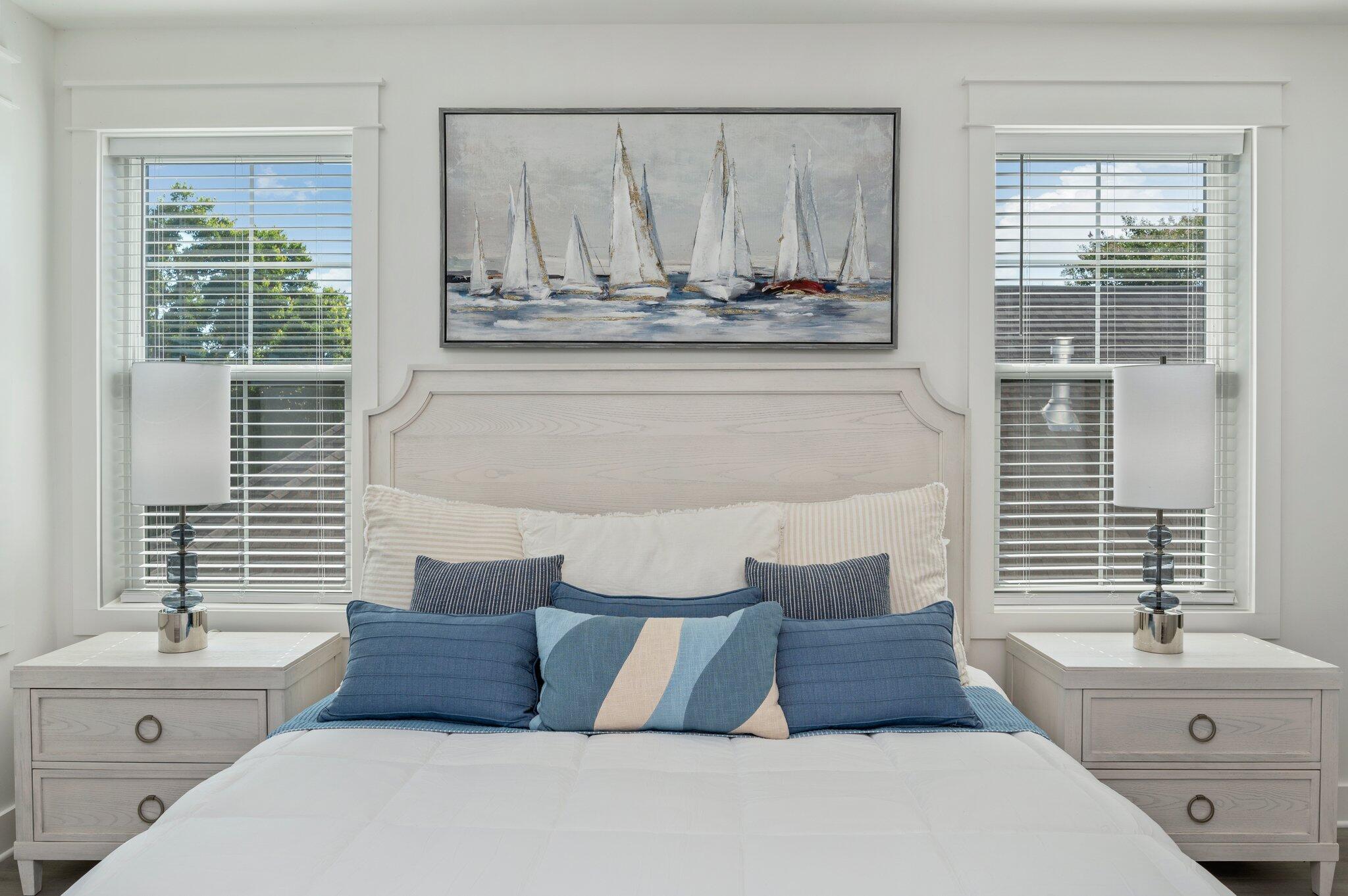 4553 Luke Avenue Destin, FL 32541 - Photo 39 of 70 a bedroom with a large bed and a window