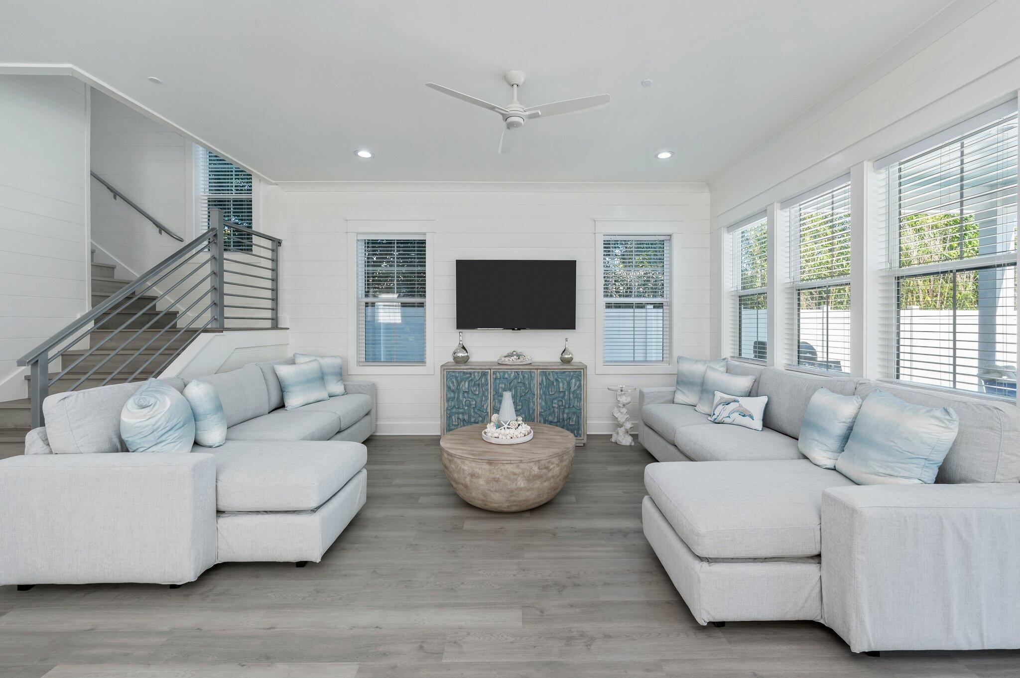 4553 Luke Avenue Destin, FL 32541 - Photo 4 of 70 a living room with furniture and a flat screen tv
