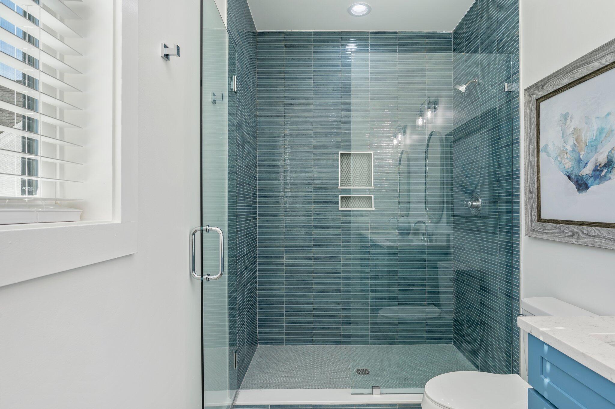 4553 Luke Avenue Destin, FL 32541 - Photo 41 of 70 a bathroom with a shower and toilet