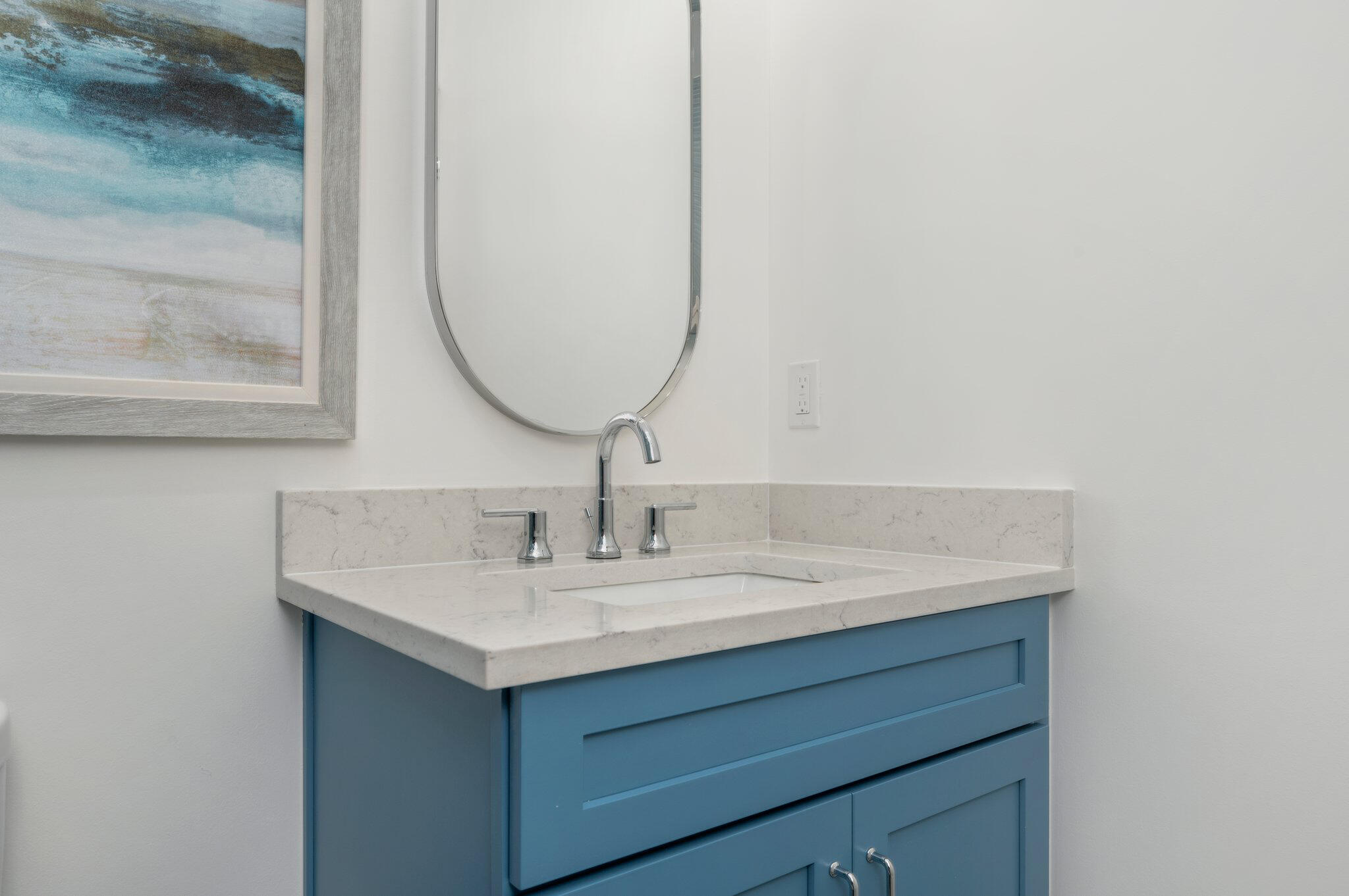 4553 Luke Avenue Destin, FL 32541 - Photo 45 of 70 a bathroom with a sink and a mirror