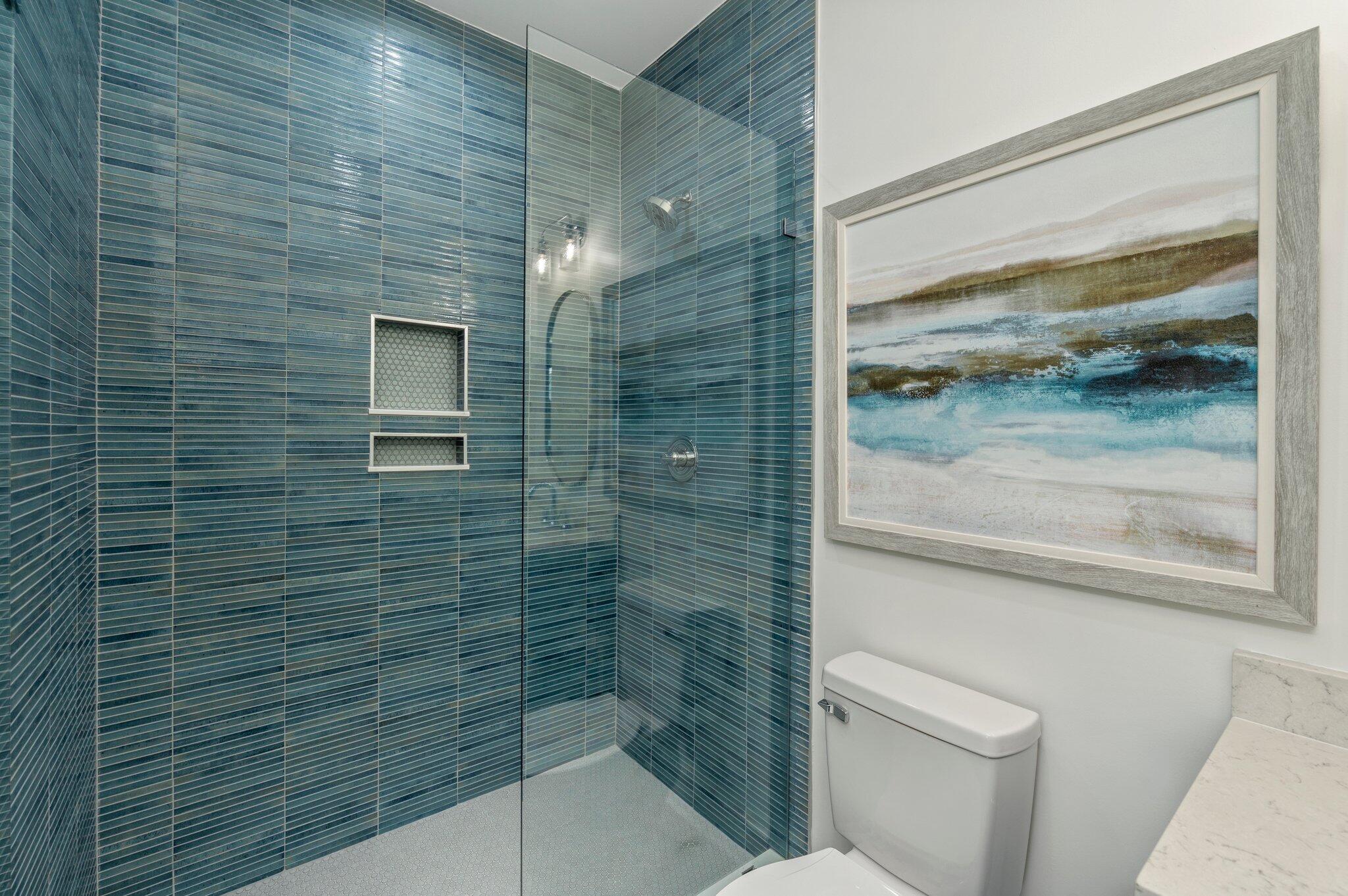 4553 Luke Avenue Destin, FL 32541 - Photo 46 of 70 a bathroom with a shower and a toilet