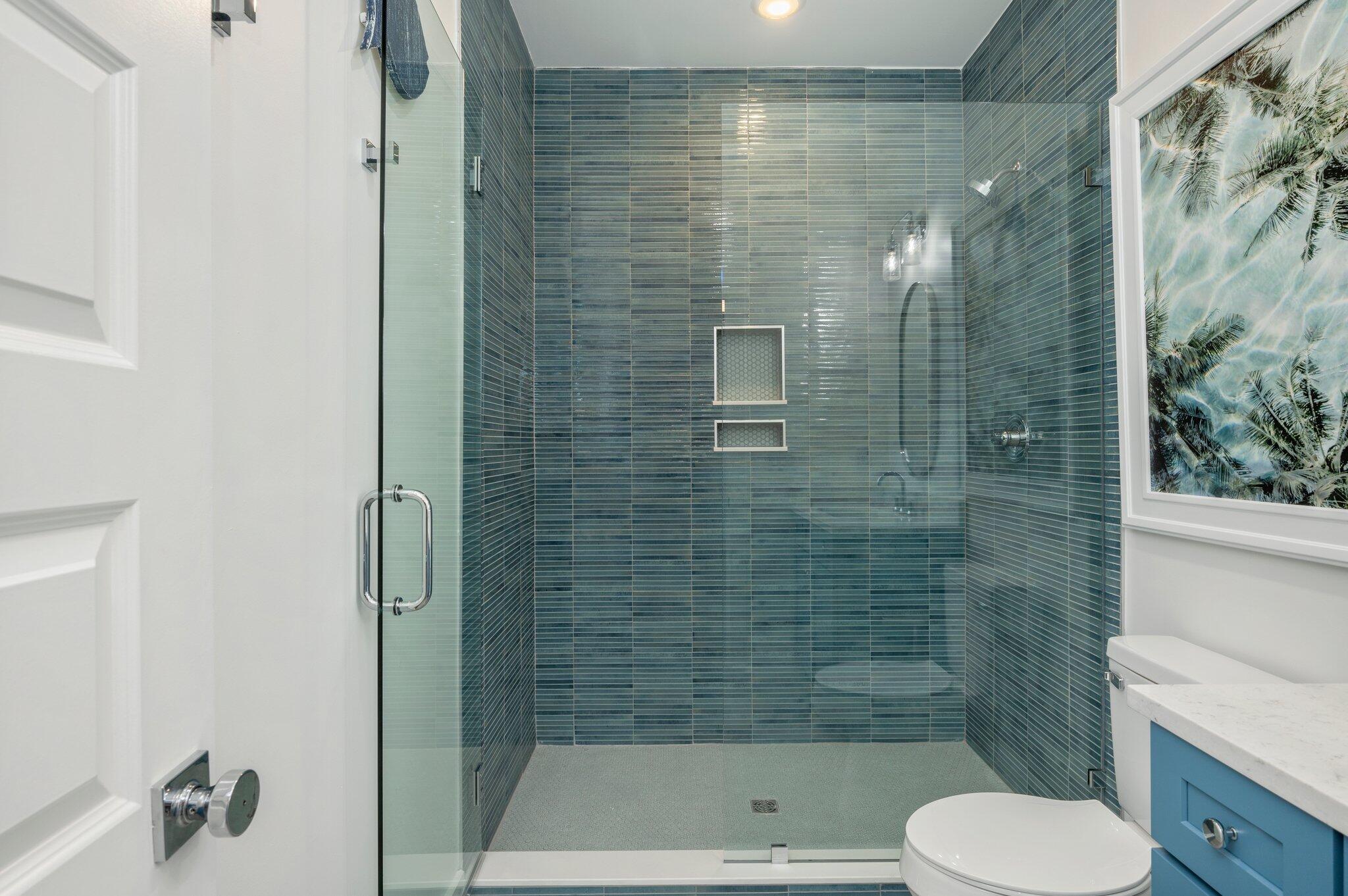 4553 Luke Avenue Destin, FL 32541 - Photo 51 of 70 a bathroom with a shower and a toilet