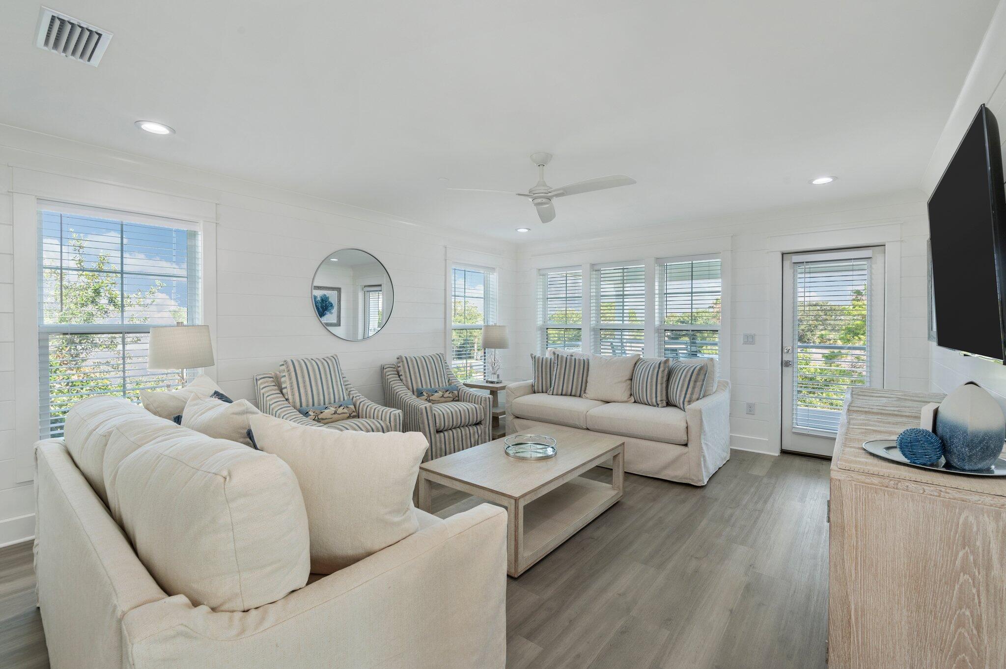 4553 Luke Avenue Destin, FL 32541 - Photo 53 of 70 a living room with furniture and a flat screen tv