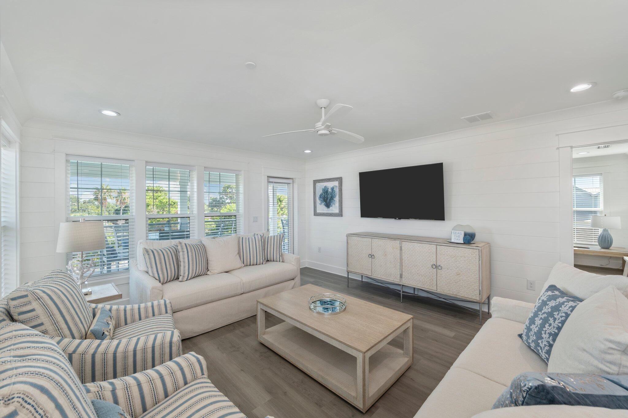 4553 Luke Avenue Destin, FL 32541 - Photo 54 of 70 a living room with furniture and a flat screen tv