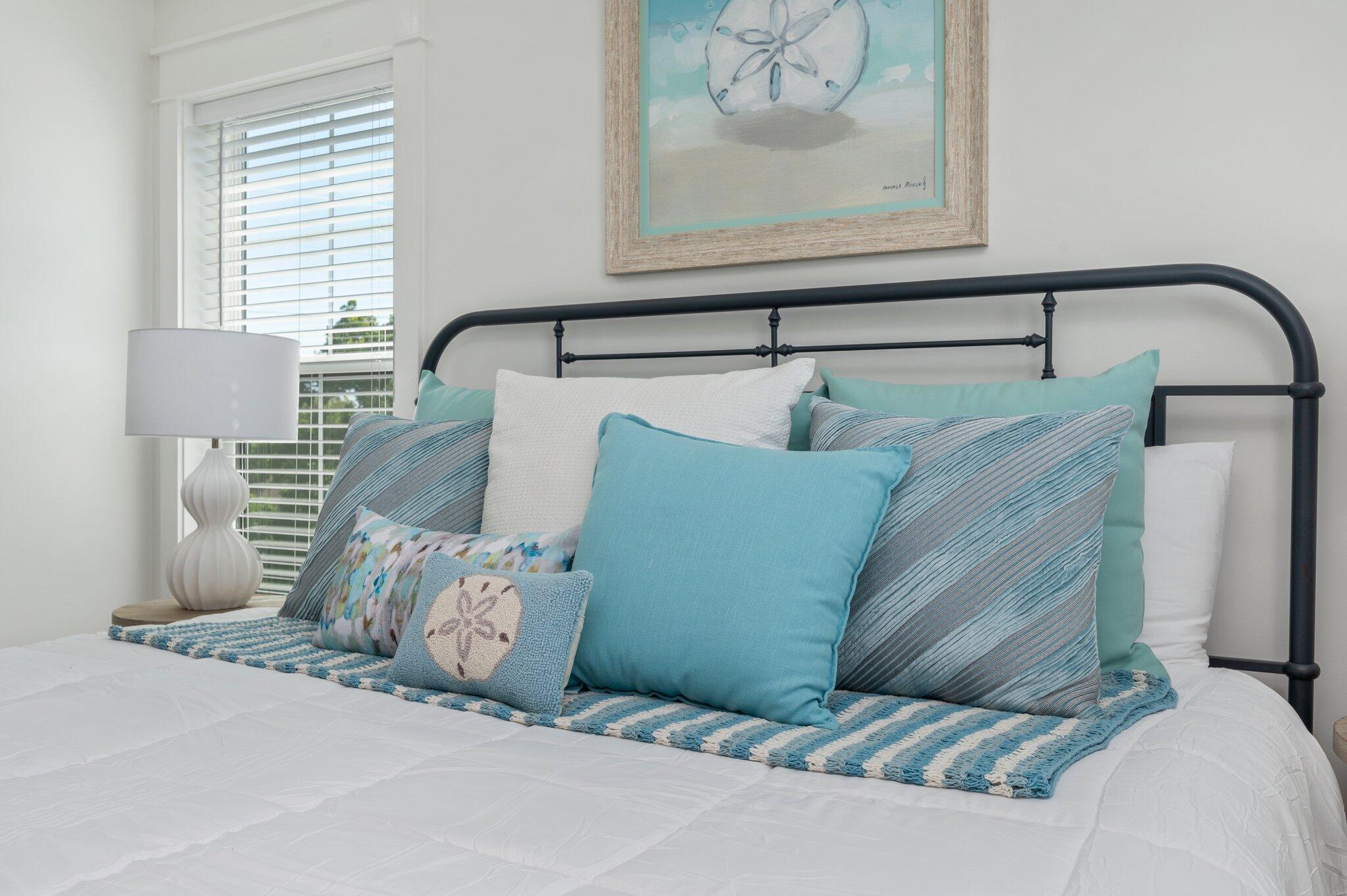 4553 Luke Avenue Destin, FL 32541 - Photo 60 of 70 a bedroom with a bed and a painting on the wall