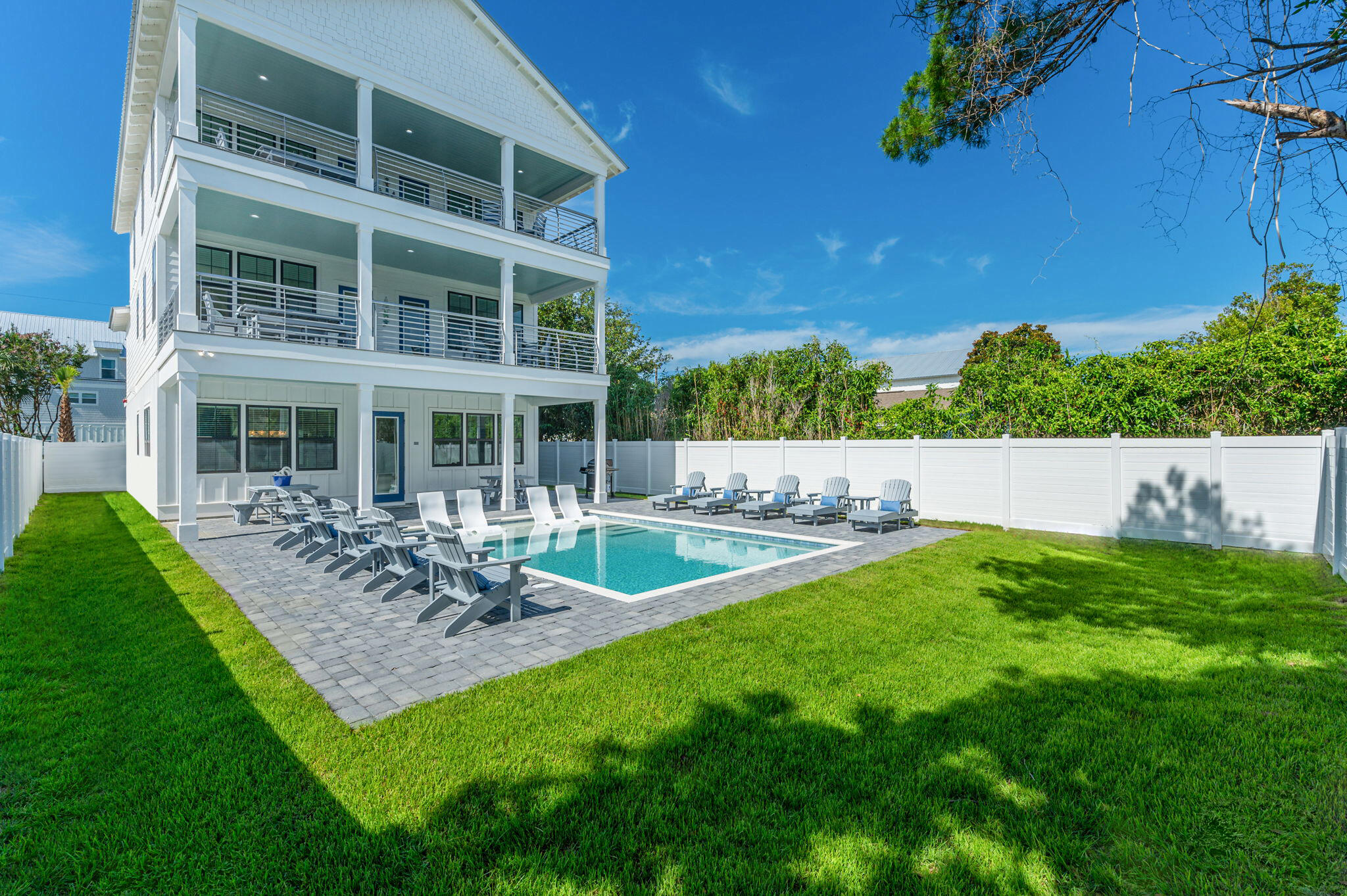 4553 Luke Avenue Destin, FL 32541 - Photo 8 of 70 a view of an house with backyard porch and sitting area