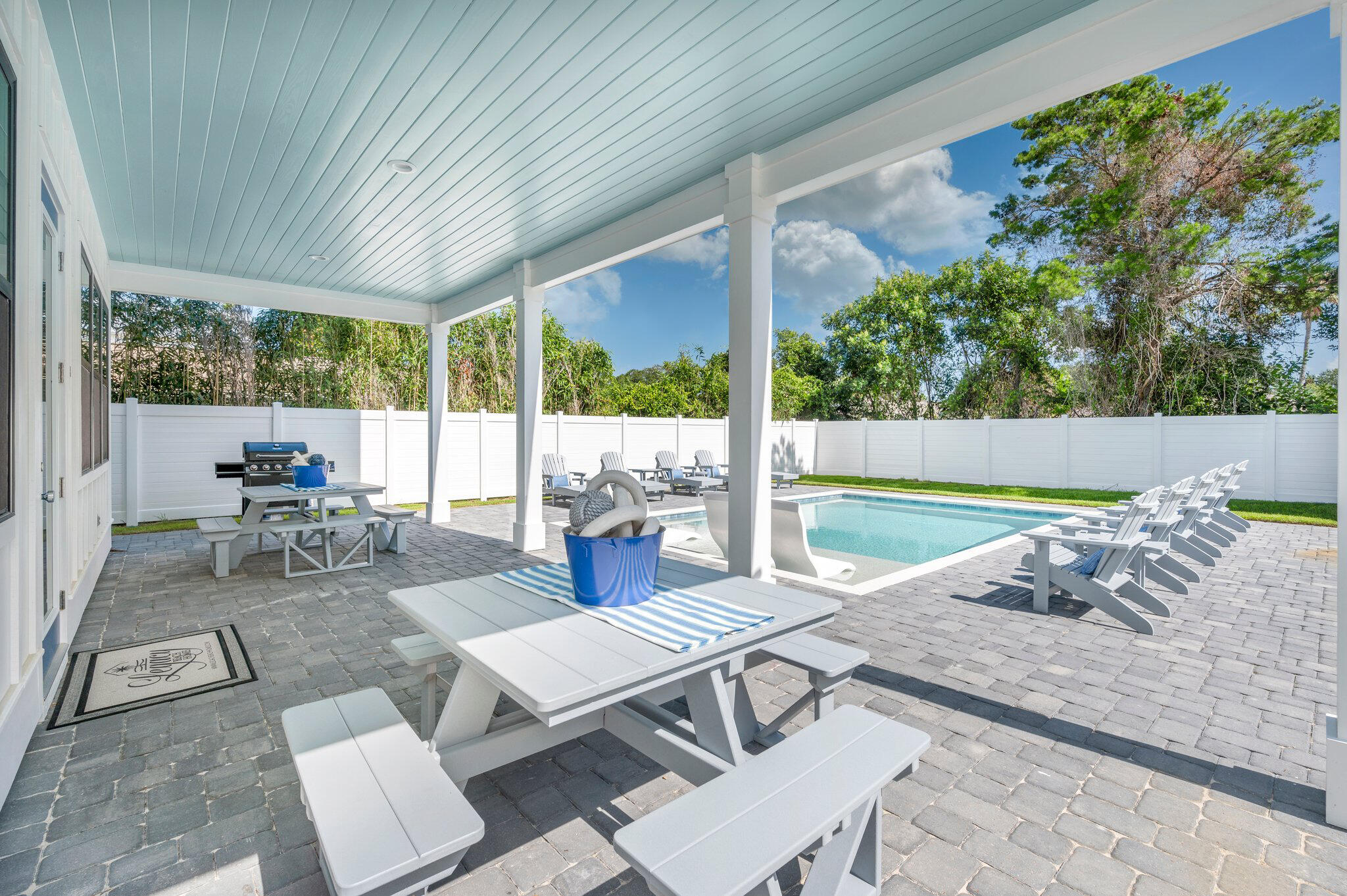 4553 Luke Avenue Destin, FL 32541 - Photo 10 of 70 a outdoor space with patio the couches and dining table with garden view