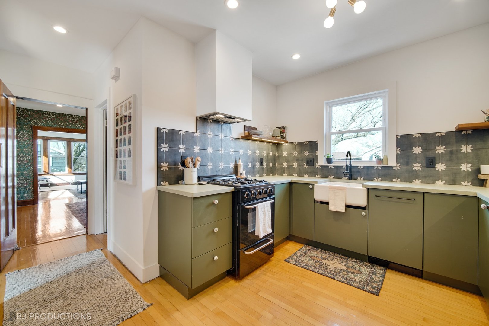 4159 North Maplewood Avenue Chicago, IL 60618 - Photo 12 of 31 a kitchen with cabinets and window