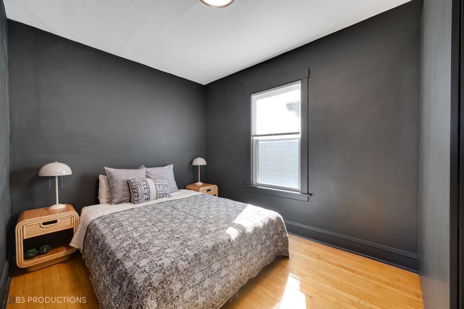 4159 North Maplewood Avenue Chicago, IL 60618 - Photo 15 of 31 a bedroom with a bed and a window