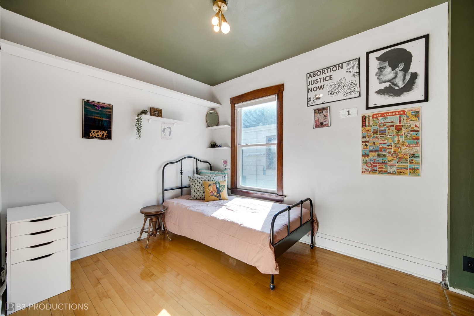 4159 North Maplewood Avenue Chicago, IL 60618 - Photo 16 of 31 a bedroom with a bed and a desk