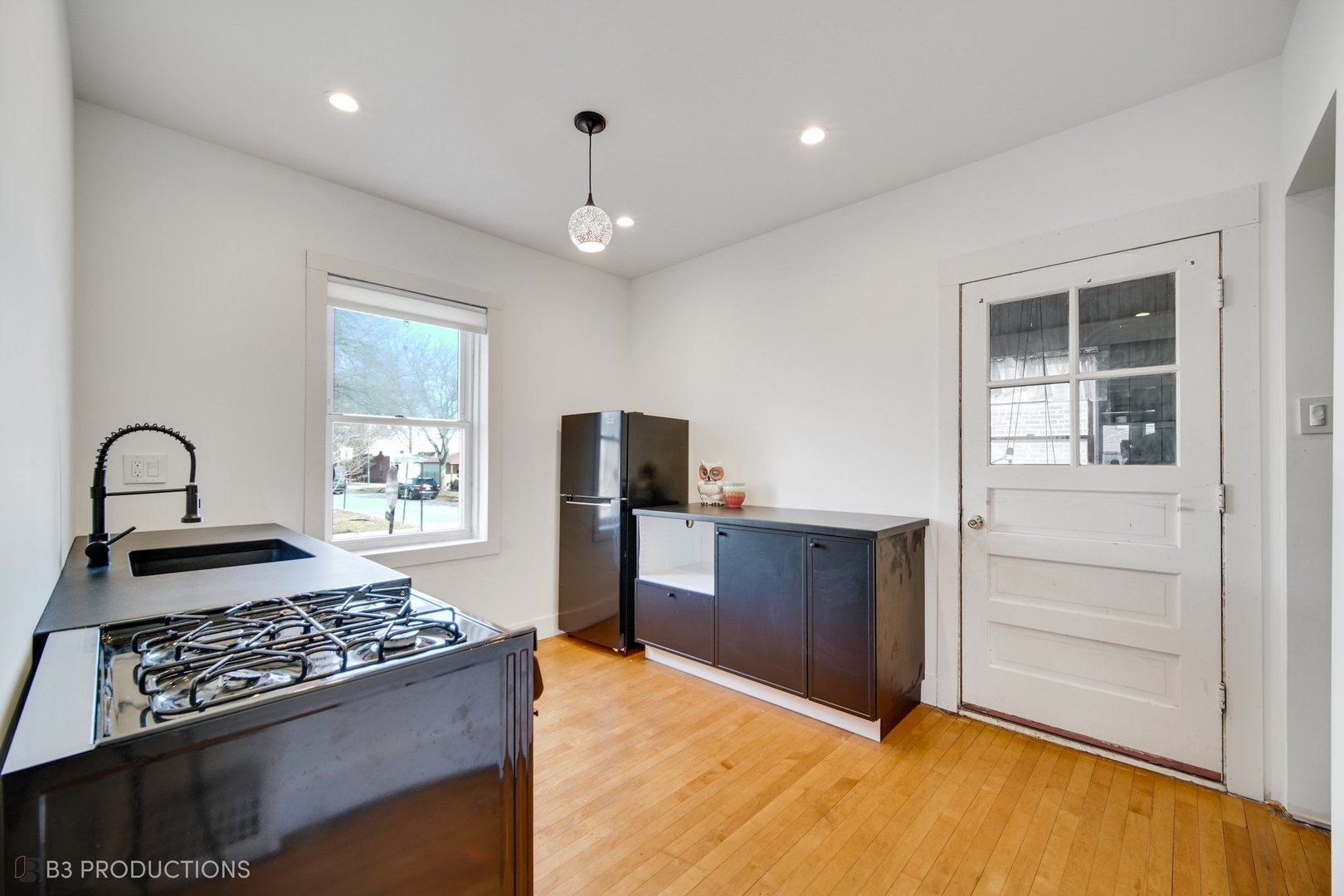 4159 North Maplewood Avenue Chicago, IL 60618 - Photo 5 of 31 a bedroom with a bed and a dresser