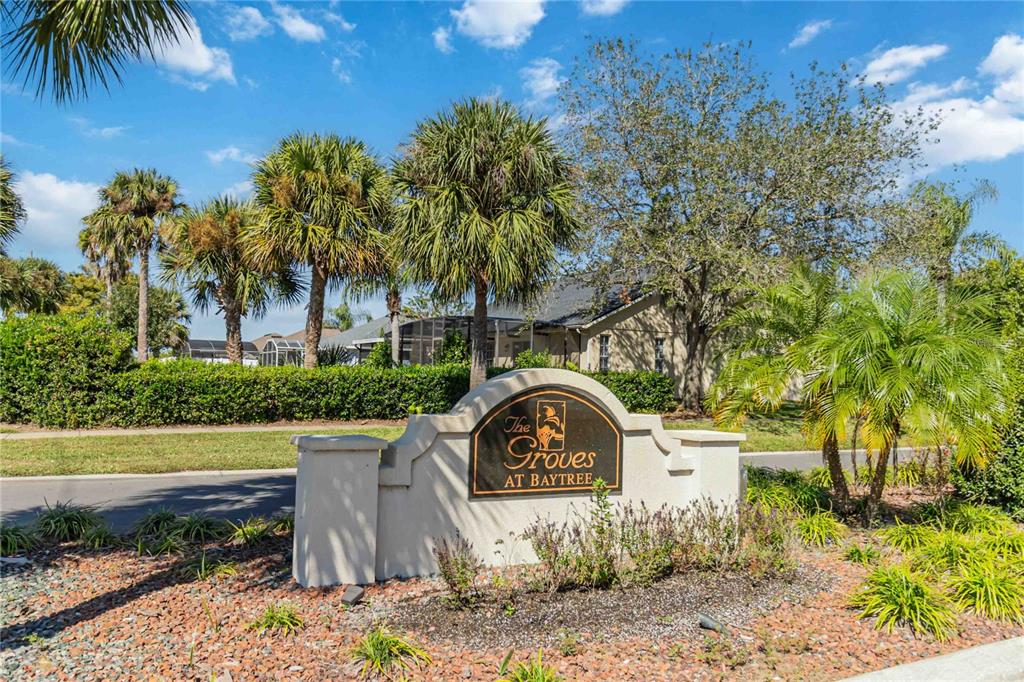559 Siesta Key Avenue Tavares, FL 32778 - Photo 23 of 24 a front view of a house with a yard