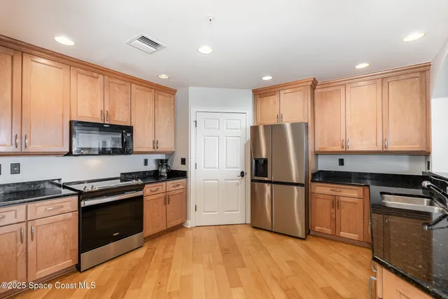 a view of a hallway with workspace