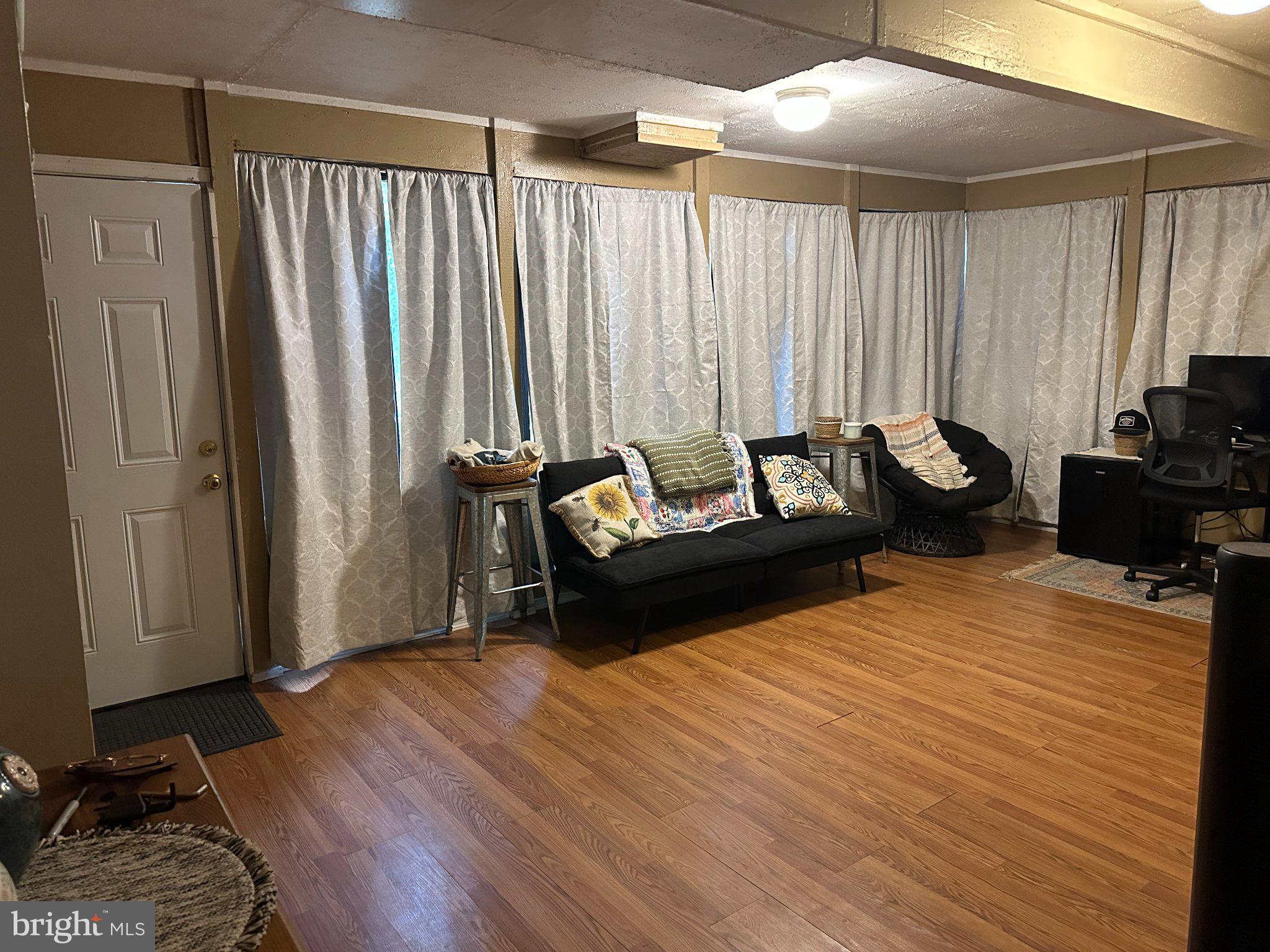 28403 Old Eden Road Eden, MD 21822 - Photo 35 of 46 a living room with furniture and a window
