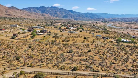 a view of mountains and with a mountain
