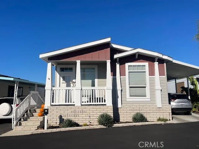 a front view of a house with a garage