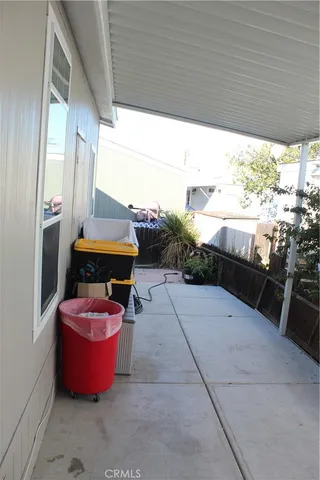 a room with furniture and a window