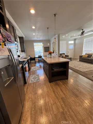 a view of a living room and kitchen view
