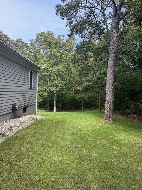 45 John Myrick Circle Brewster, MA 02631 - Photo 11 of 32 a backyard of a house with lots of green space