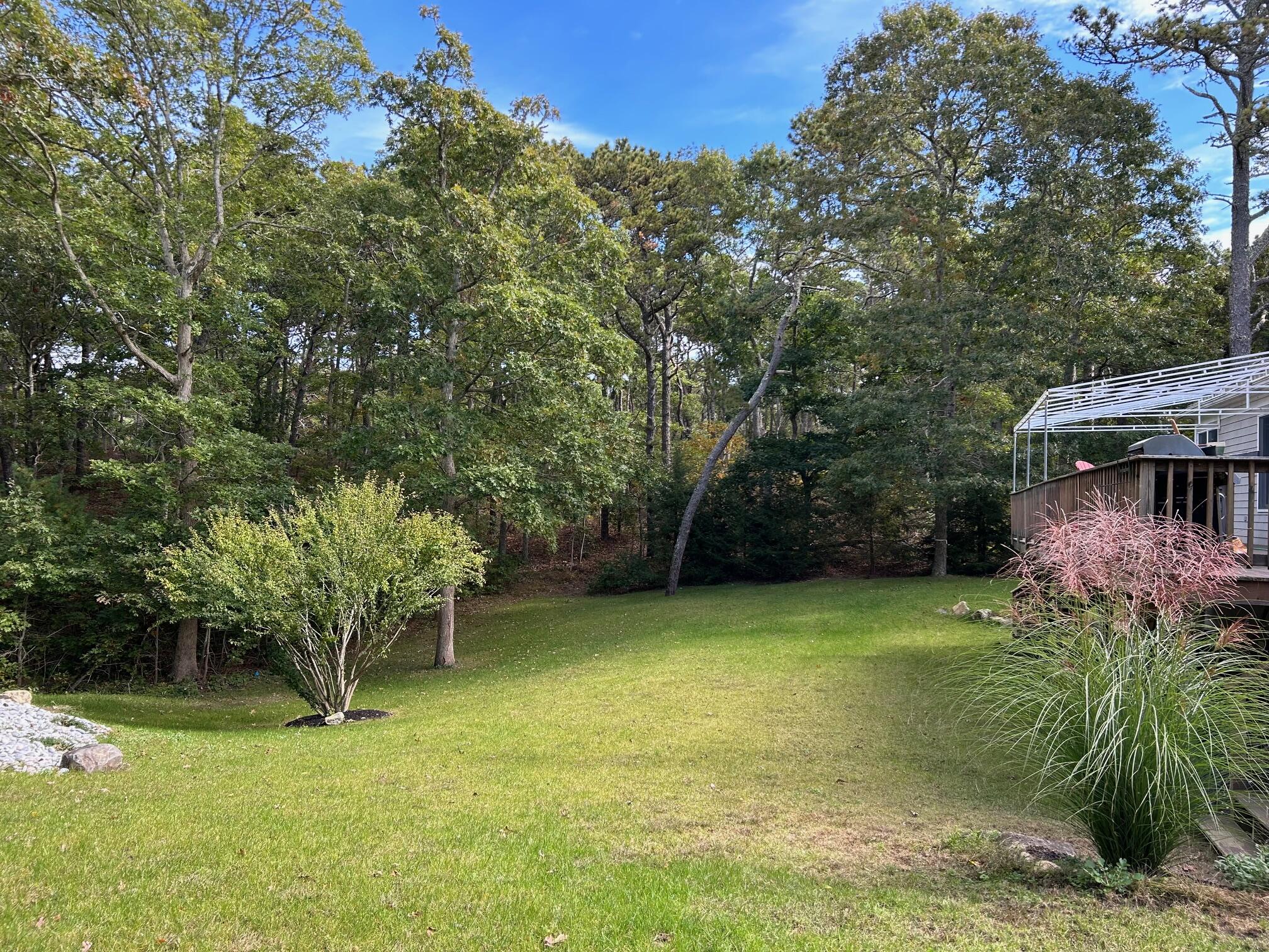 45 John Myrick Circle Brewster, MA 02631 - Photo 12 of 32 a view of a backyard with swimming pool