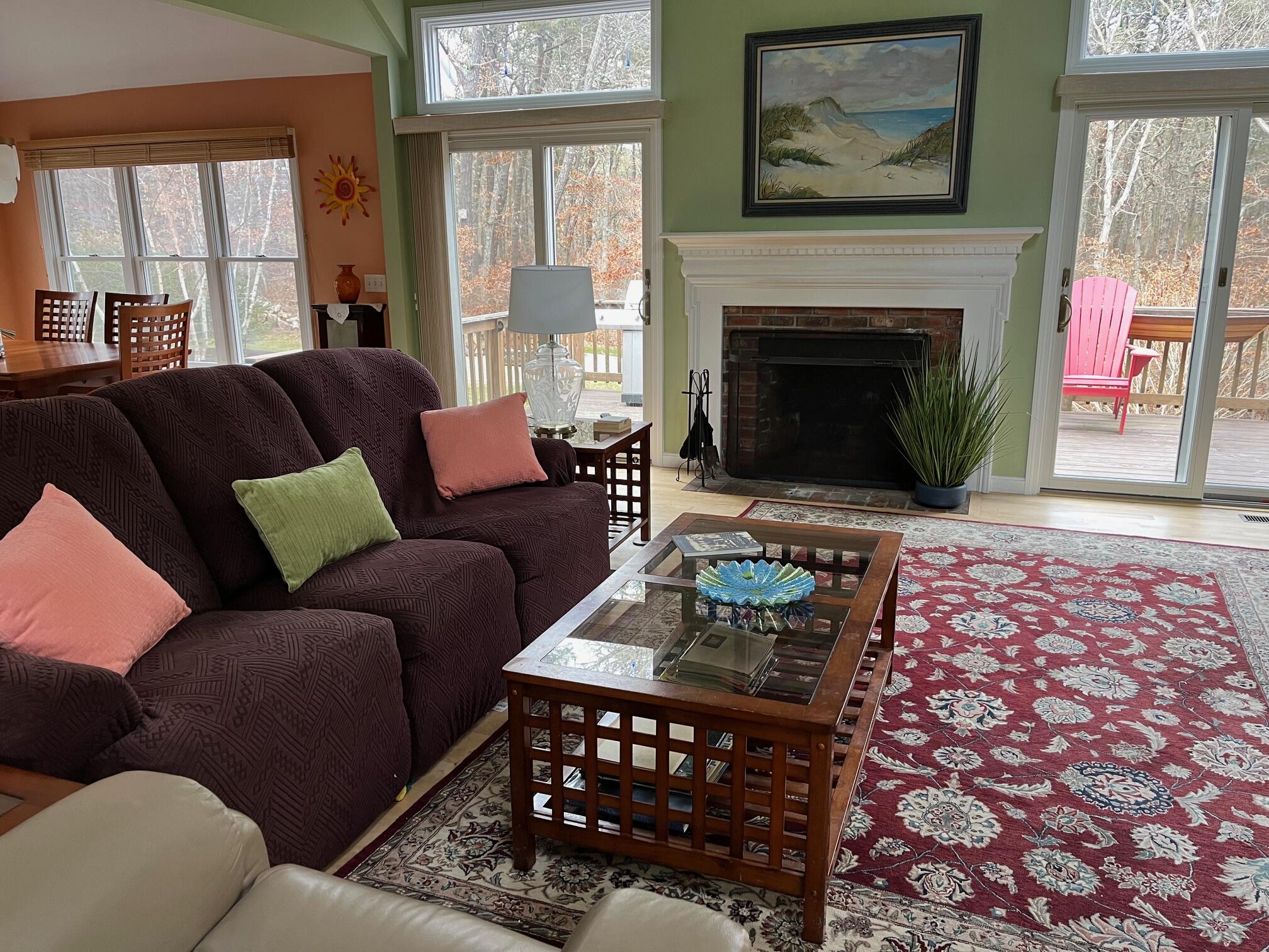 45 John Myrick Circle Brewster, MA 02631 - Photo 18 of 32 a living room with furniture and a fireplace
