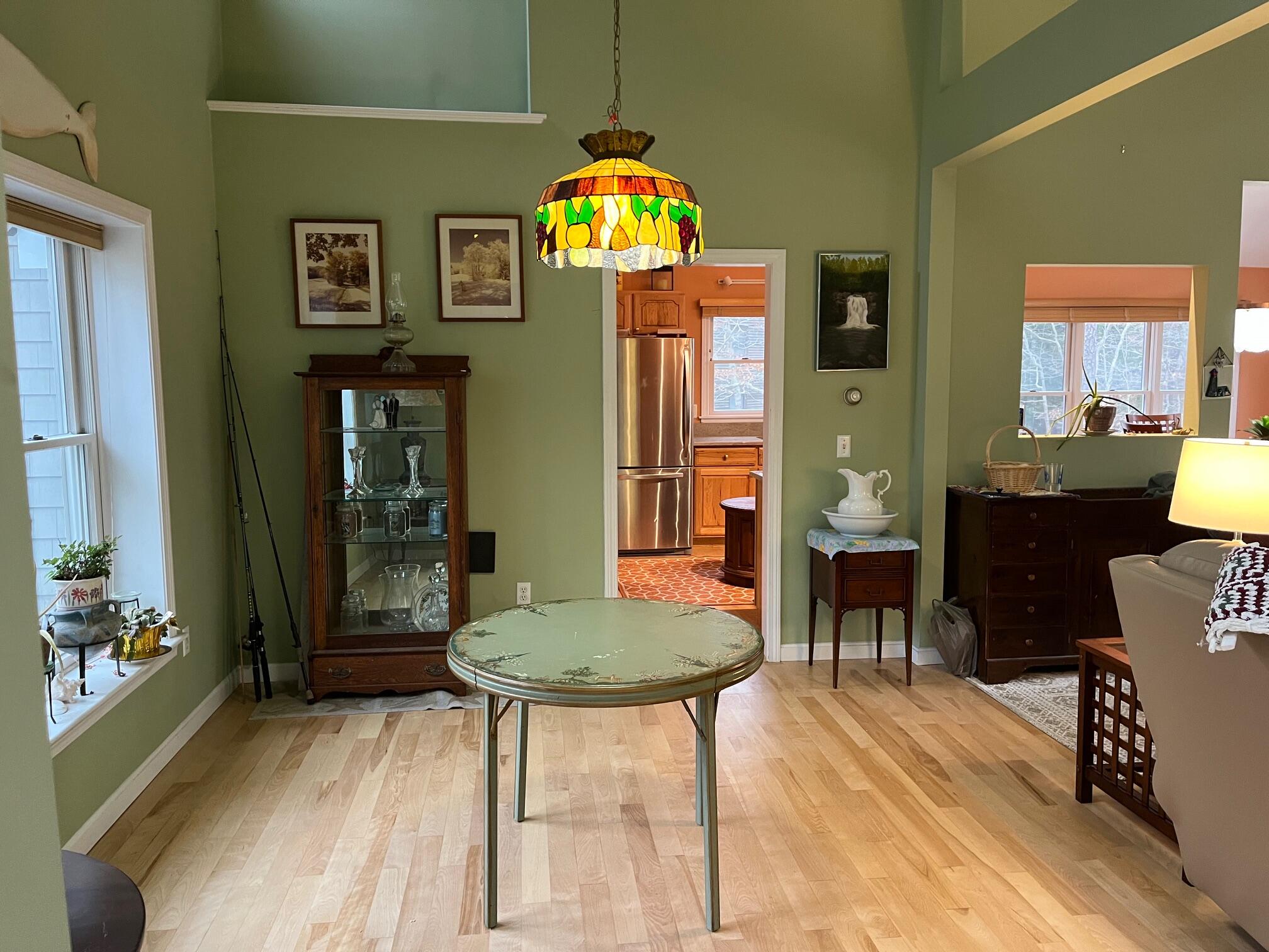 45 John Myrick Circle Brewster, MA 02631 - Photo 19 of 32 a view of a dining room with furniture and chandelier