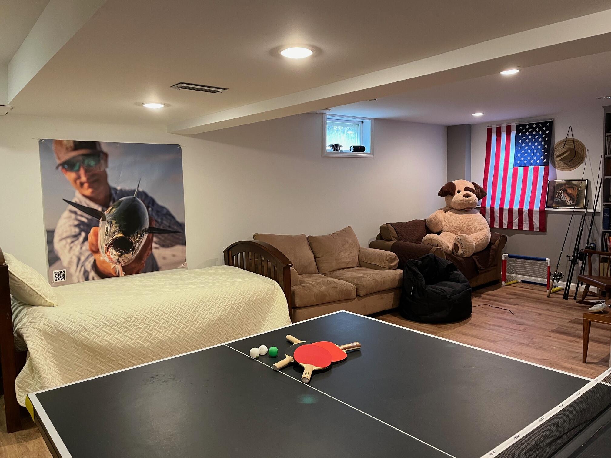 45 John Myrick Circle Brewster, MA 02631 - Photo 29 of 32 a living room with furniture gym equipment and a large window