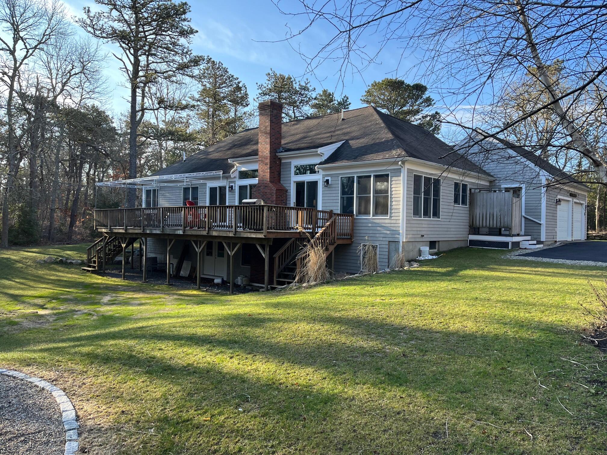 45 John Myrick Circle Brewster, MA 02631 - Photo 3 of 32 a view of a house with a swimming pool