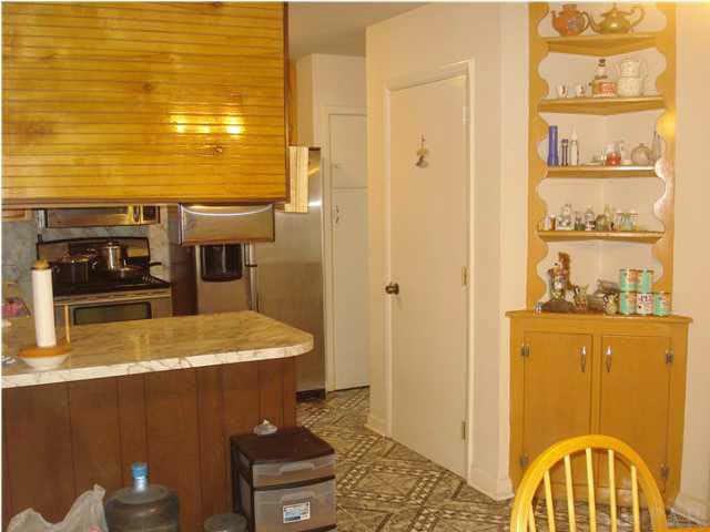 6469 Berryhill Road Milton, FL 32570 - Photo 4 of 11 Built in corner cabinet in the dining room.