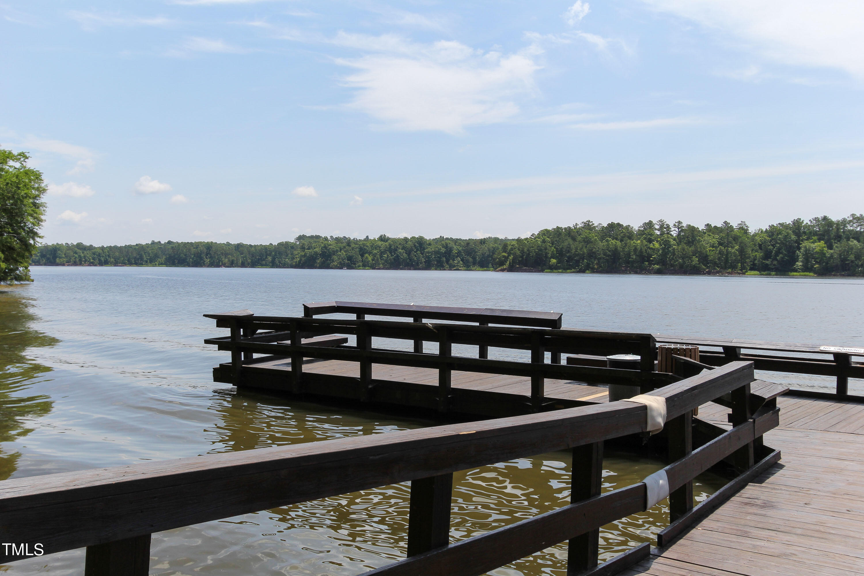 224 Deercroft Drive Apex, NC 27539 - Photo 38 of 39 a view of a lake from a balcony