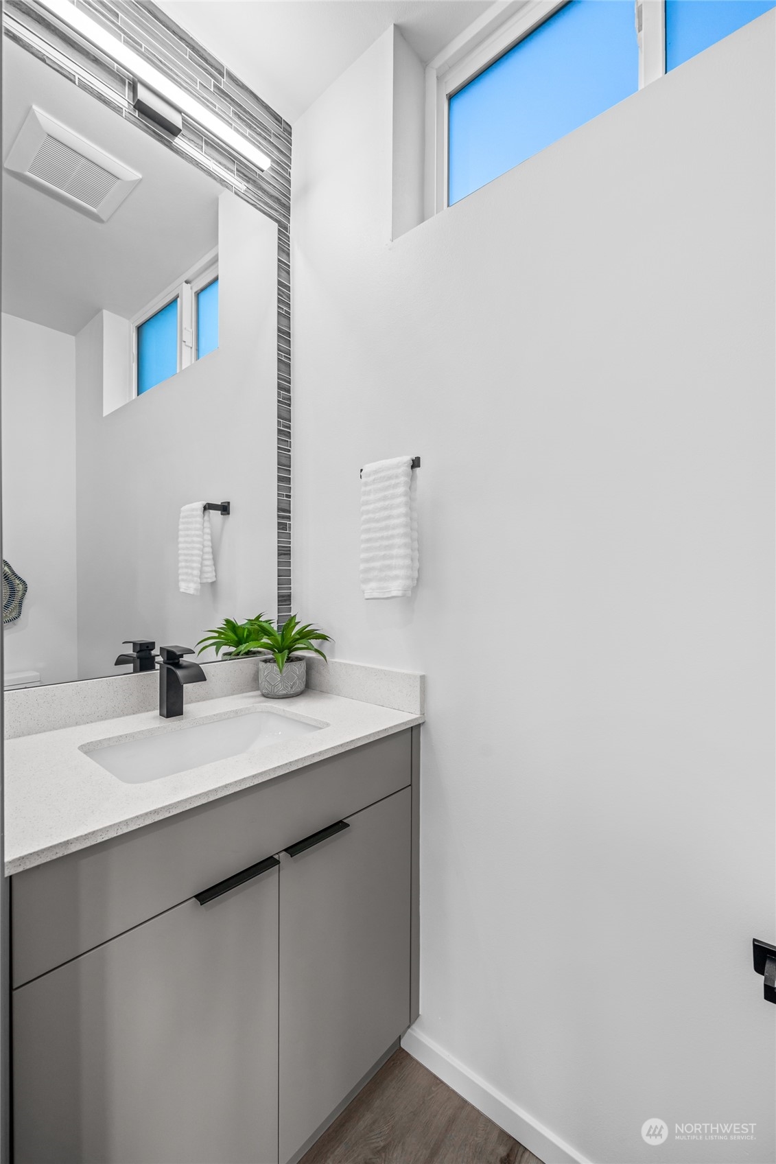 1621 South State Street Seattle, WA 98144 - Photo 14 of 23 a bathroom with a sink and a mirror