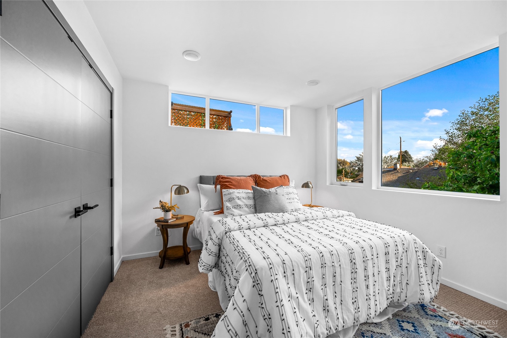 1621 South State Street Seattle, WA 98144 - Photo 16 of 23 a bedroom with a bed and a mirror