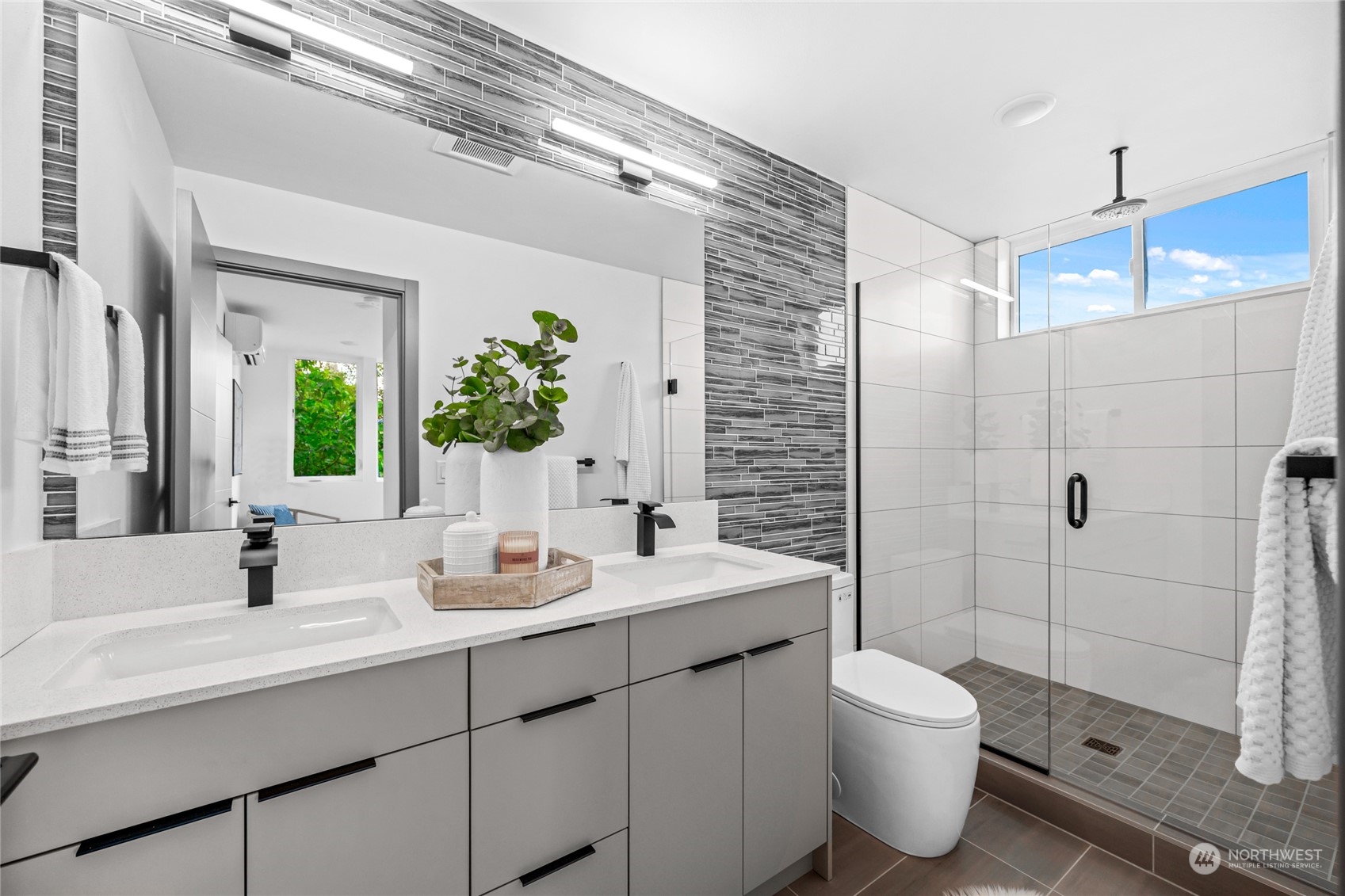 1621 South State Street Seattle, WA 98144 - Photo 18 of 23 a bathroom with a double vanity sink toilet and shower