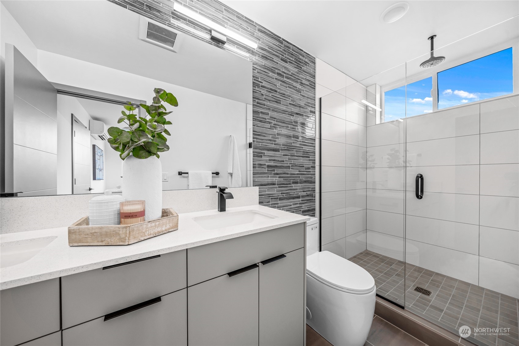 1621 South State Street Seattle, WA 98144 - Photo 20 of 23 a bathroom with a granite countertop toilet sink and shower