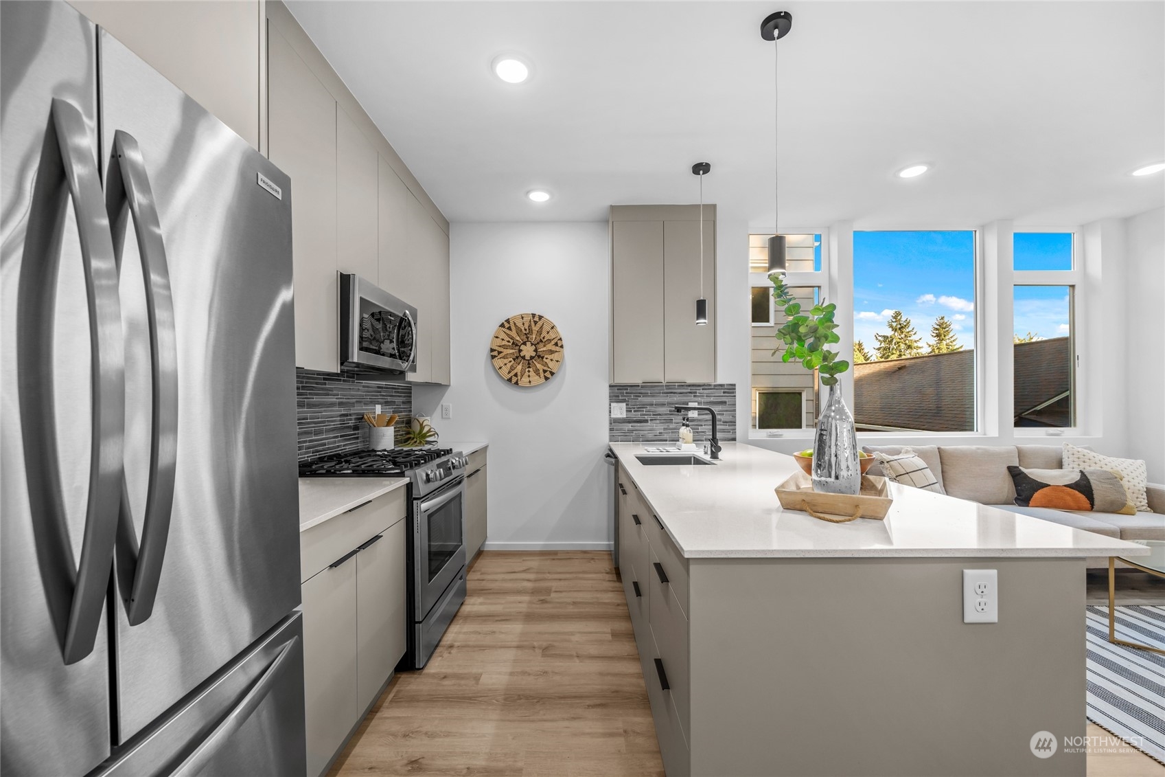 1621 South State Street Seattle, WA 98144 - Photo 8 of 23 a kitchen with stainless steel appliances granite countertop a refrigerator a stove and a sink