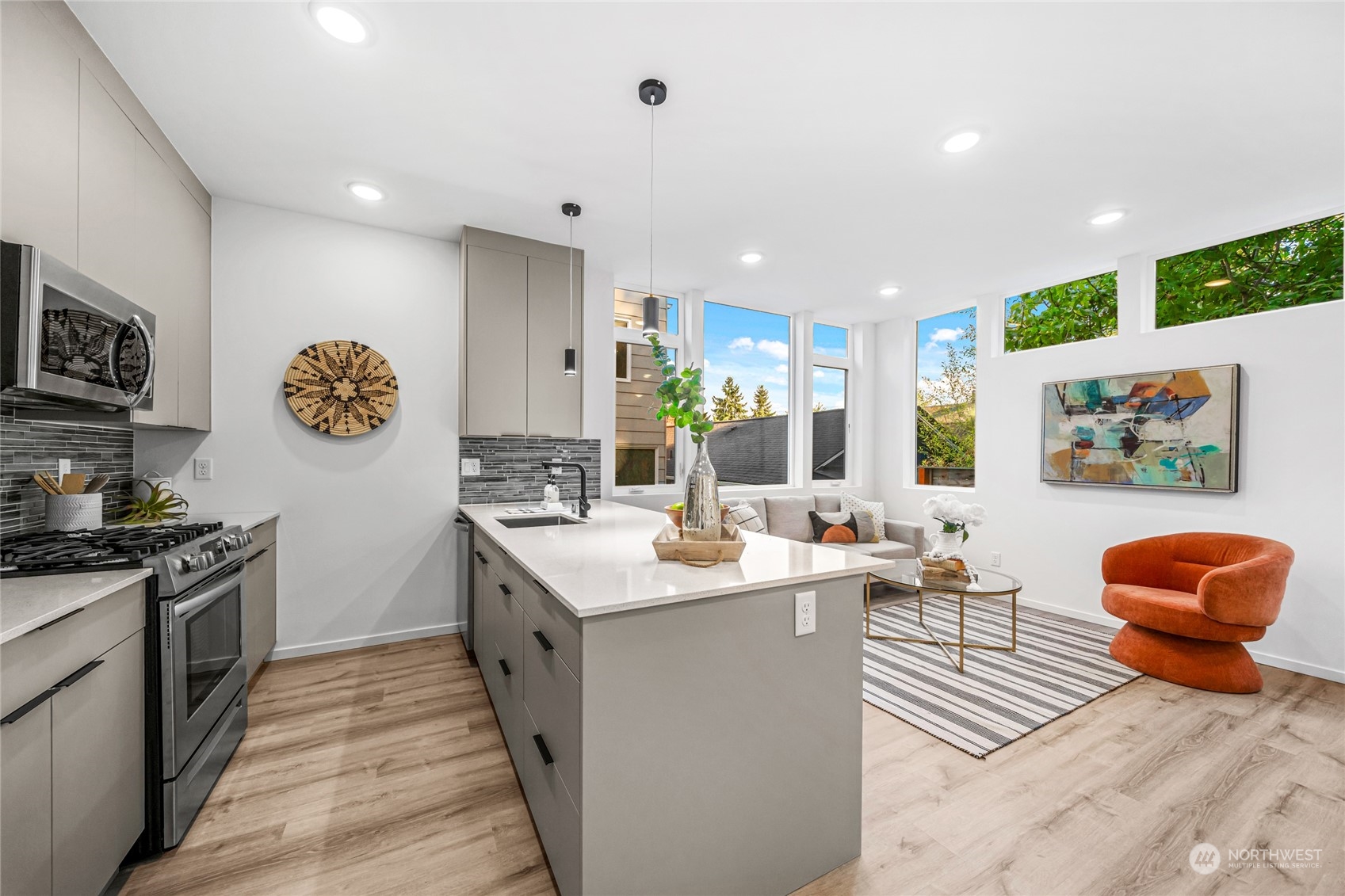 1621 South State Street Seattle, WA 98144 - Photo 9 of 23 a living room with stainless steel appliances furniture and a kitchen view