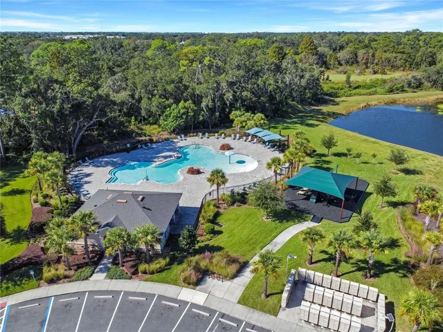 an aerial view of a house with a garden