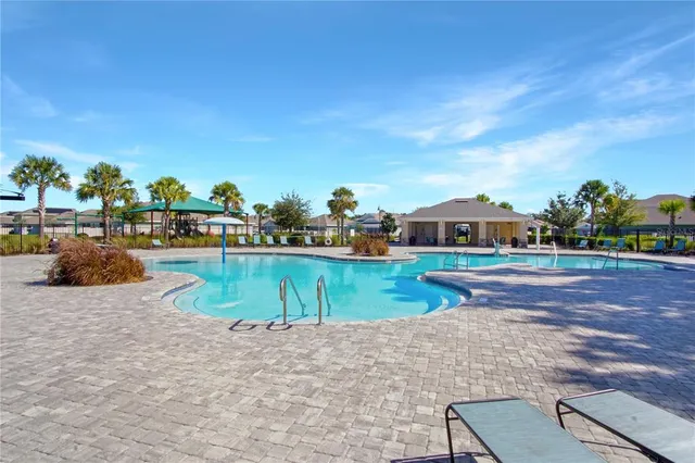 a view of a swimming pool and outdoor space