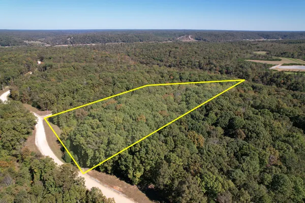 a view of a balcony with an outdoor space