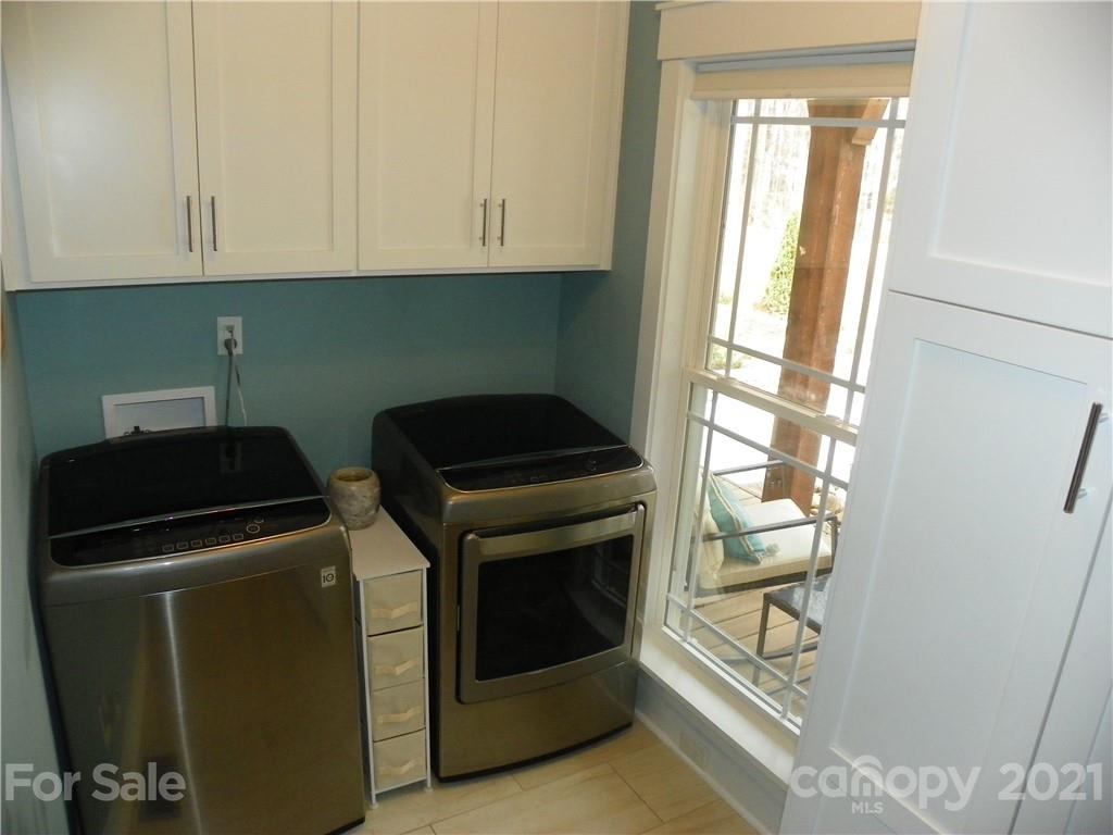 10617 Fink Road Mount Pleasant, NC 28124 - Photo 22 of 45 a kitchen with stainless steel appliances granite countertop a stove and a microwave