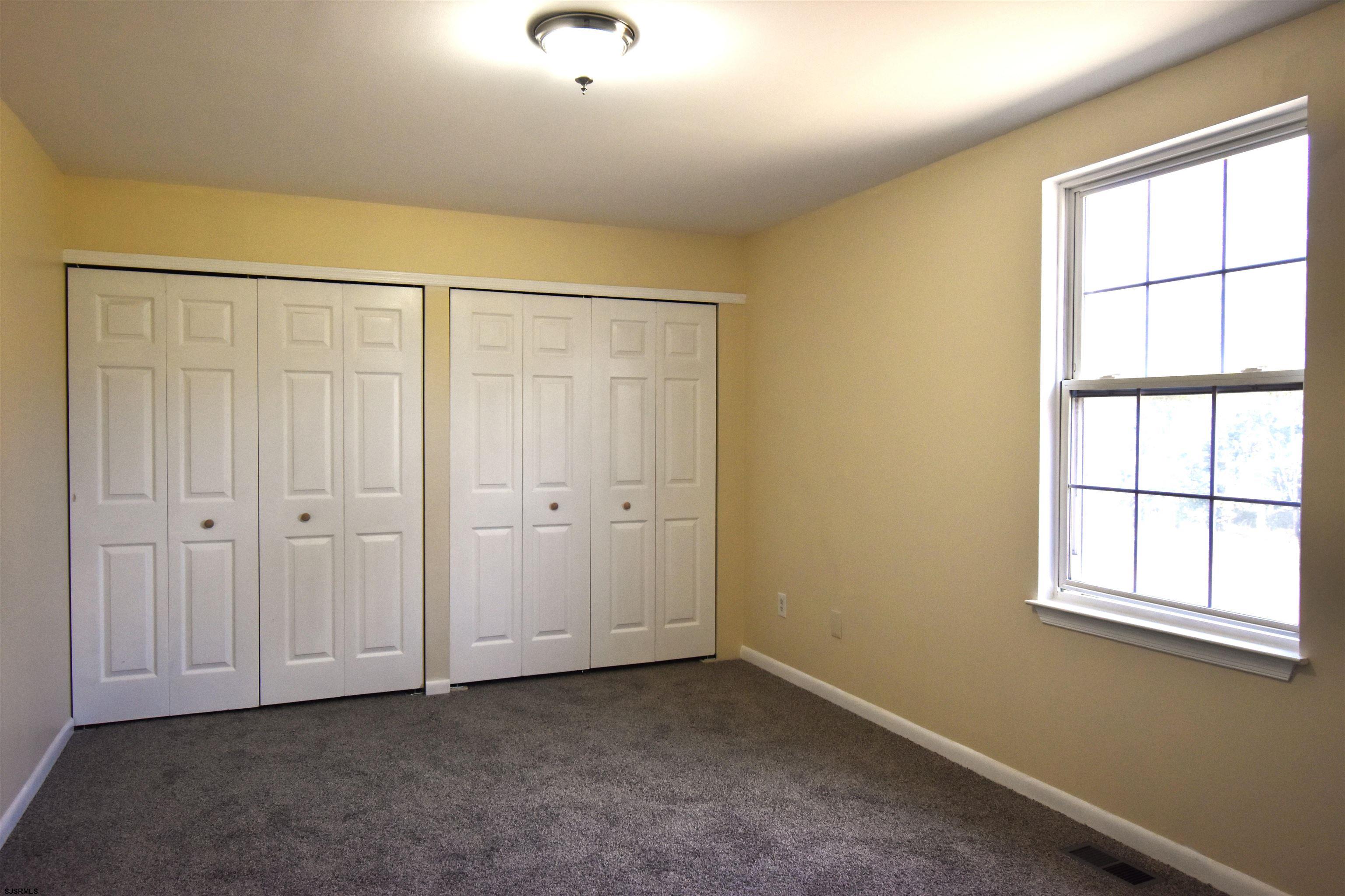 3580 South Main Road Vineland, NJ 08360 - Photo 8 of 11 an empty room with a window