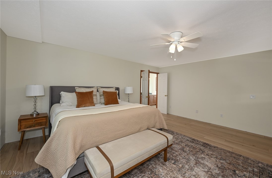 4845 State Road Medina, OH 44256 - Photo 19 of 47 Bedroom featuring light wood-style floors and a ceiling fan