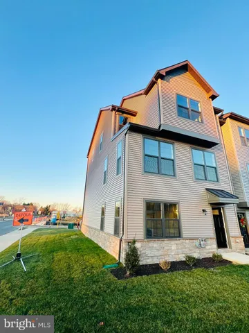 a car parked in front of a house