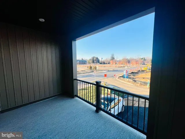 a view of balcony with furniture