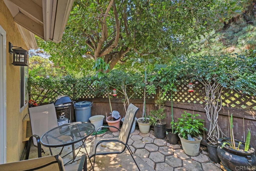 1145 Helix Street, Unit 1 Spring Valley, CA 91977 - Photo 15 of 30 a view of a backyard with furniture and a potted plant