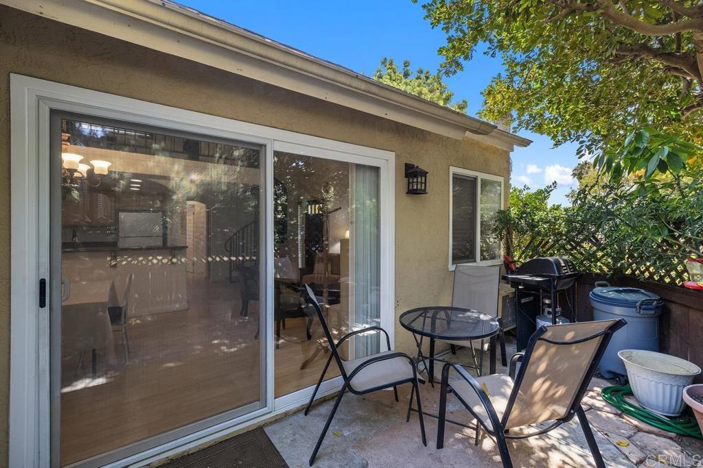1145 Helix Street, Unit 1 Spring Valley, CA 91977 - Photo 16 of 30 a view of a balcony dining table and chairs