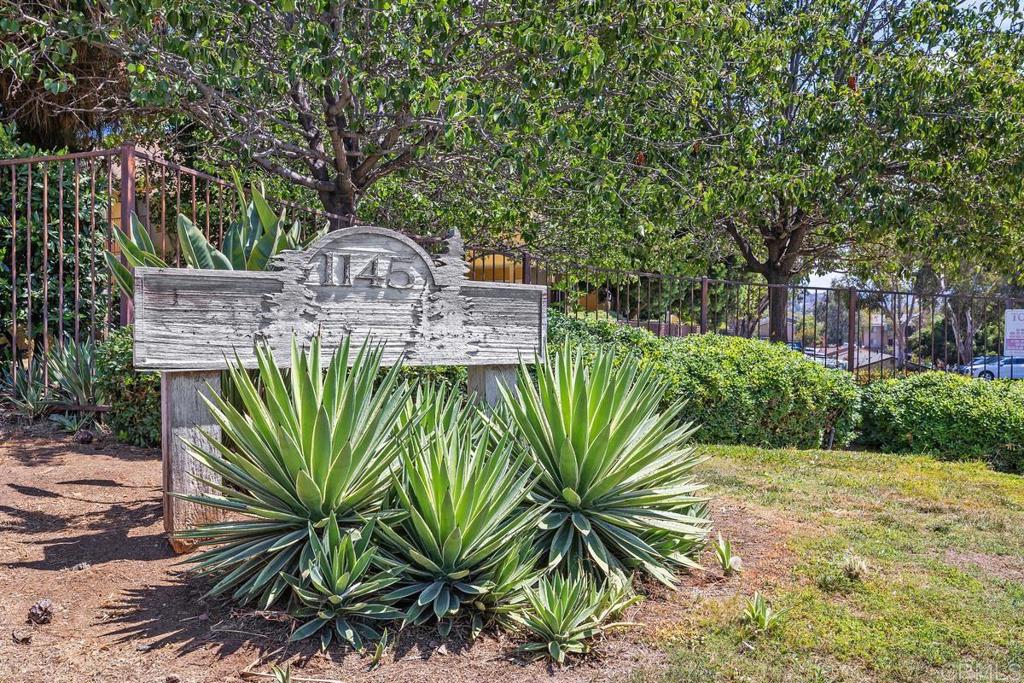 1145 Helix Street, Unit 1 Spring Valley, CA 91977 - Photo 2 of 30 a front view of a house with a garden
