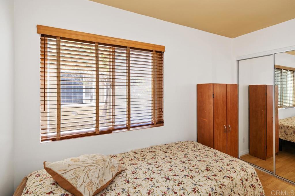 1145 Helix Street, Unit 1 Spring Valley, CA 91977 - Photo 23 of 30 a view of a bedroom with a large window